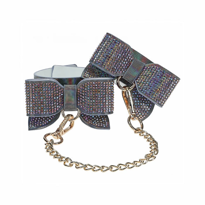 Ouch! Paris Collection Iridescent Leather Adjustable Handcuffs With Bedazzled Bow Accent